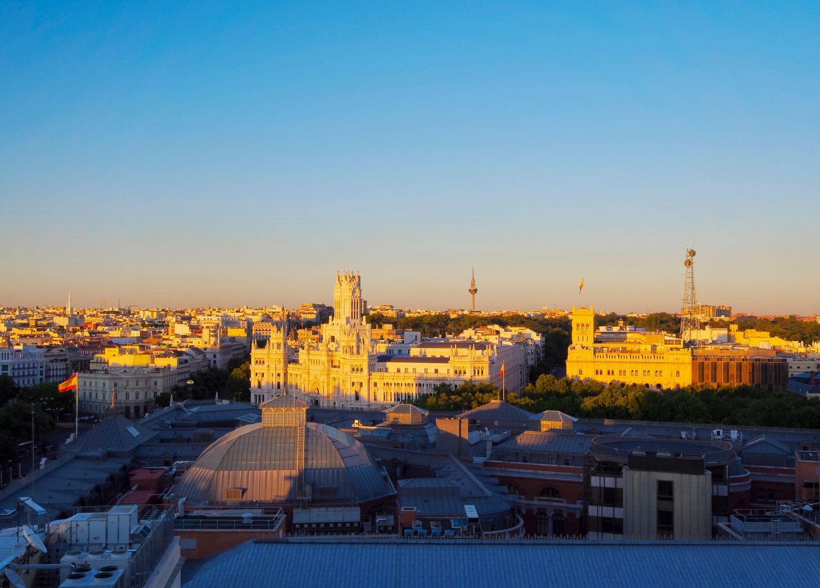 Spain, Madrid, Elevated view of the Cybele Palace at sunset.